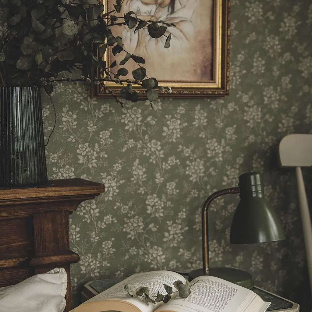 Reed green floral wallpaper styled in a Dubai bedroom