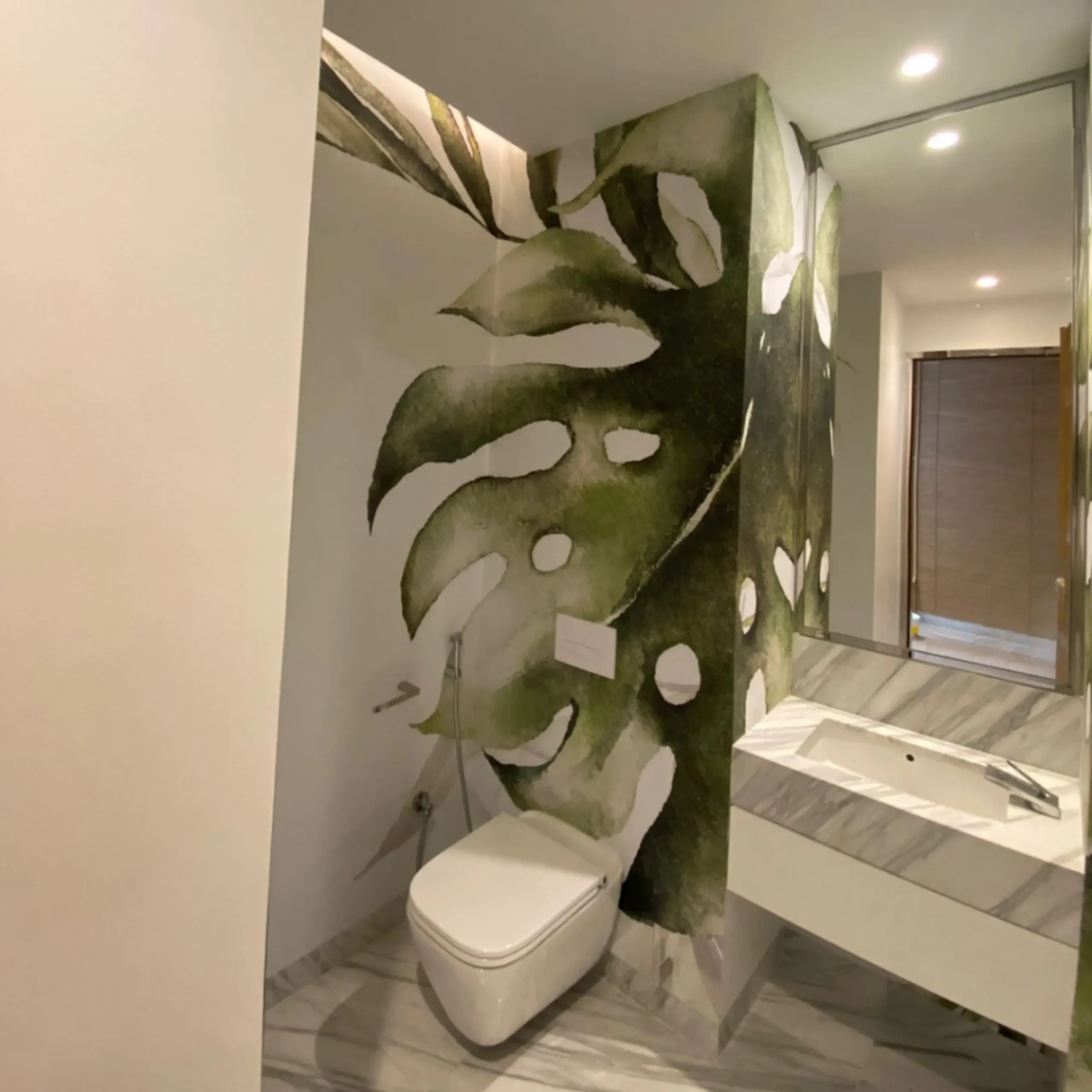 Premium wallpaper installed in a Dubai living room